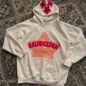 Aelfriceden Cream Hoodie with Pink Star Design sz small